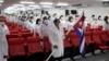 Médicos cubanos reunidos antes de ir a misión. (REUTERS/Alexandre Meneghini/Archivo)