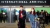 Pasajeros procedentes de Shanghai, China, arriban al aeropuerto internacional de Los Angeles, en California el 26 de enero. (REUTERS/Ringo Chiu)