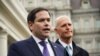 Foto Archivo. Los senadores Marco Rubio y Rick Scott hablan a la prensa. MANDEL NGAN / AFP